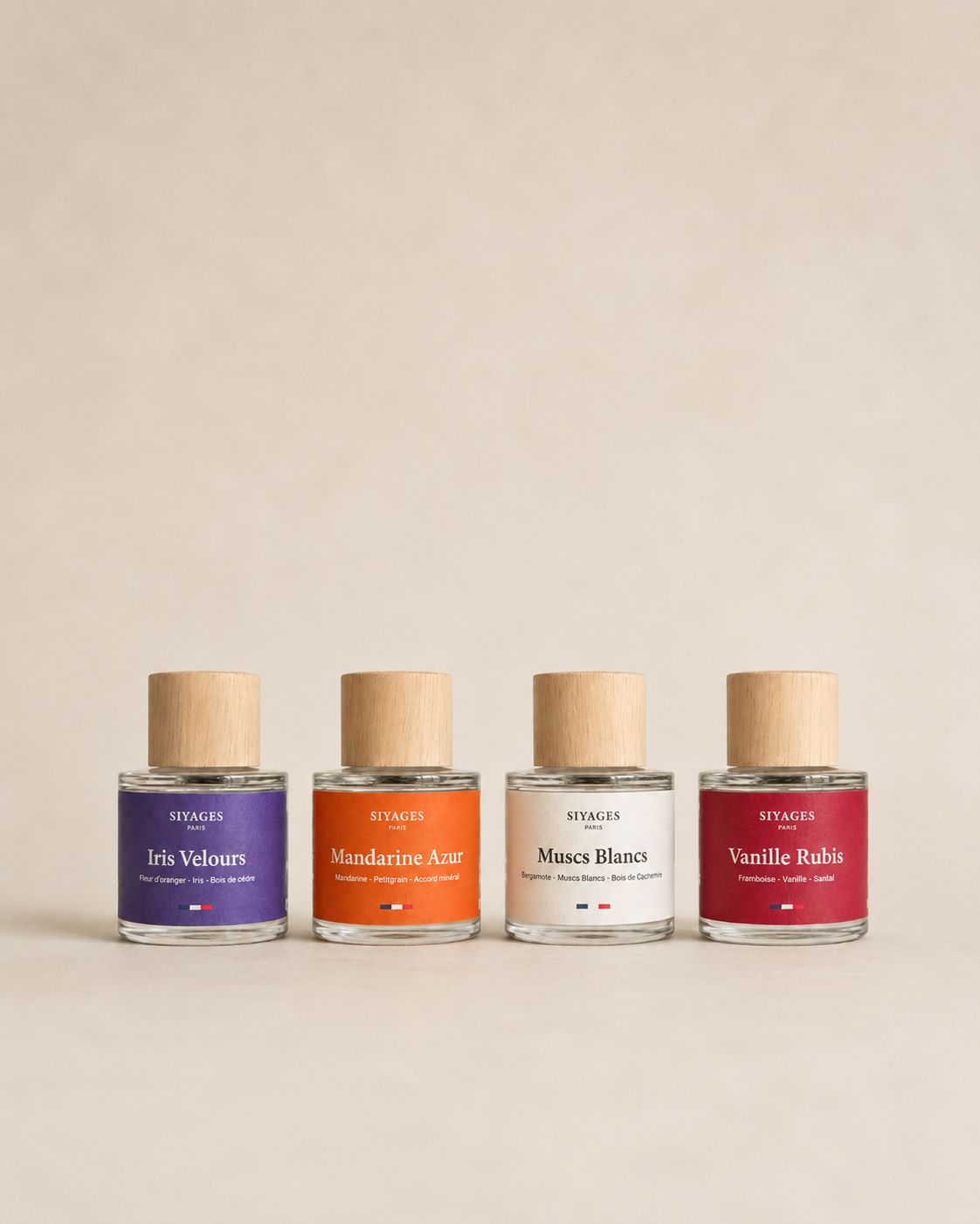 Les 4 parfums Siyages alignés : Iris Velours, Mandarine Azur, Muscs Blancs et Vanille Rubis, eau de parfum fabriquée en France